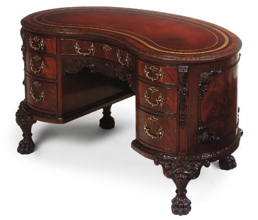 A LATE VICTORIAN MAHOGANY KIDNEY SHAPED DESK