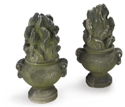 A PAIR OF GRITSTONE FLAMBEAU URN FINIALS