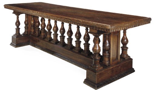 AN ITALIAN WALNUT REFECTORY TABLE