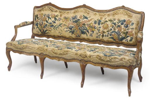 A LOUIS XV PROVINCIAL CHESTNUT AND NEEDLEWORK UPHOLSTERED CANAPE