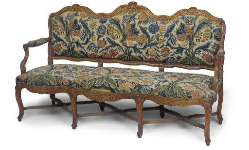 A LOUIS XV WALNUT AND NEEDLEWORK UPHOLSTERED CANAPE