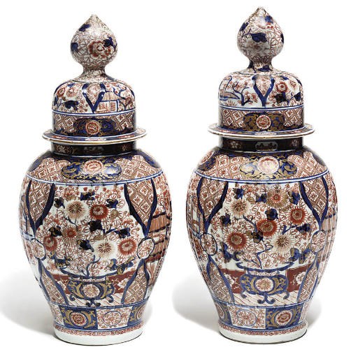 A Pair of Japanese vases and covers
