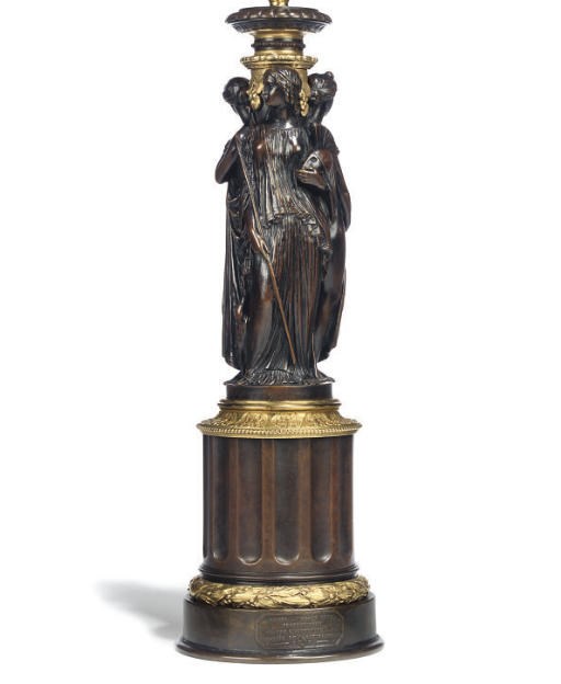 A FRENCH GILT AND PATINATED BRONZE FIGURAL REGULATOR OIL LAMP