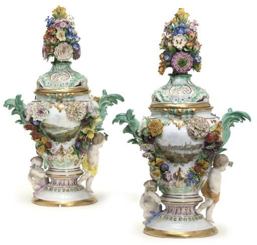 A PAIR OF MEISSEN TOPOGRAPHICAL VASES AND COVERS