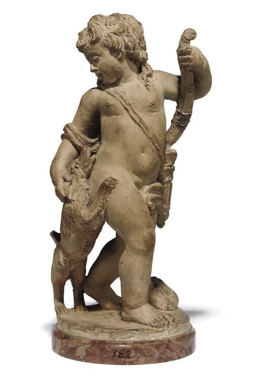 A FRENCH TERRACOTTA GROUP OF A BOY WITH DOG