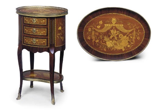A FRENCH GILT-METAL MOUNTED MAHOGANY KINGWOOD AND MARQUETRY TABLE EN CHIFFONIER