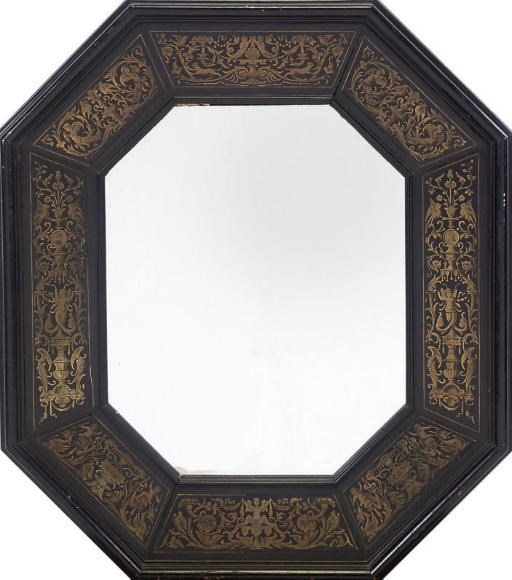 A FRENCH BRASS INLAID EBONY AND EBONISED OCTAGONAL MIRROR