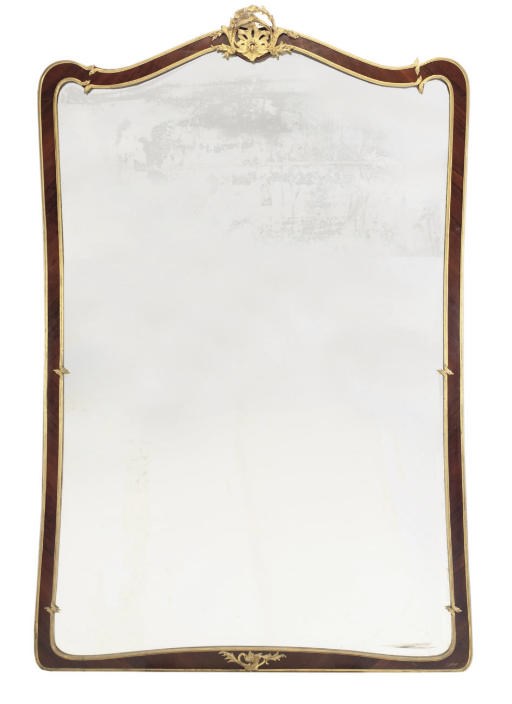 A FRENCH ORMOLU MOUNTED KINGWOOD MIRROR