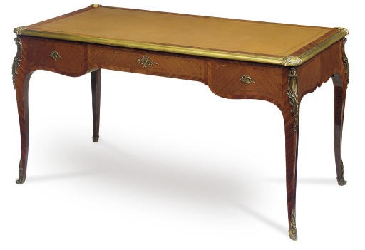 A FRENCH GILT-METAL MOUNTED KINGWOOD BUREAU PLAT