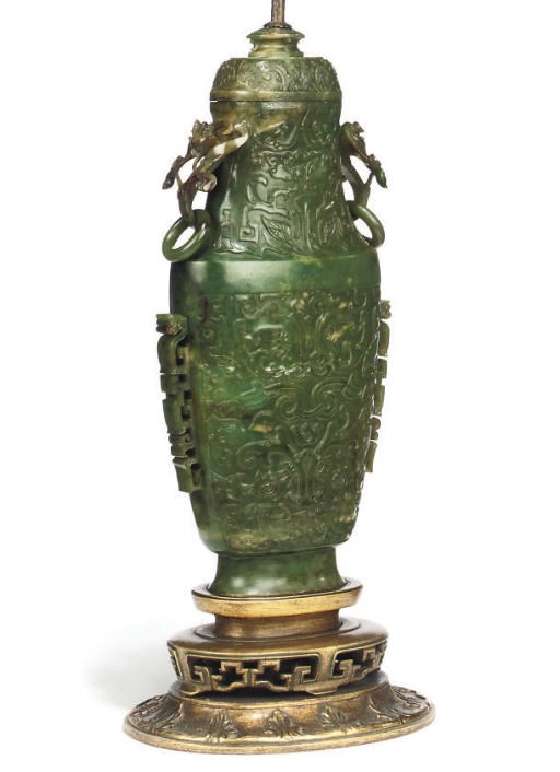 A CHINESE GREEN JADE VASE