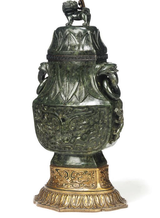 A CHINESE GREEN JADE VASE AND COVER