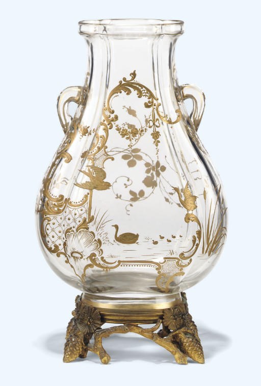 A FRENCH GILT-BRONZE MOUNTED PARCEL-GILT DECORATED CUT-GLASS VASE