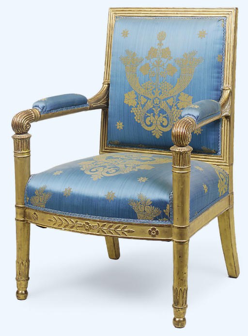 A FRENCH EMPIRE GILTWOOD FAUTEUIL