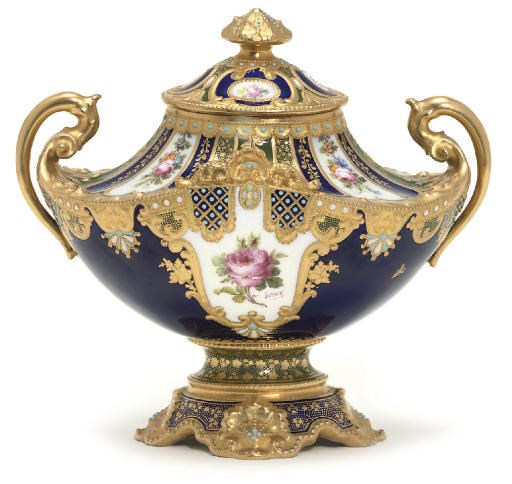 A ROYAL CROWN DERBY TWO-HANDLED VASE AND COVER