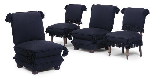 A SUITE OF FOUR NORTH EUROPEAN UPHOLSTERED EASY CHAIRS