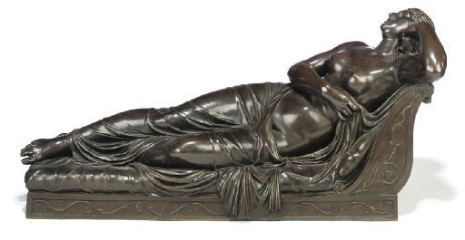 A FRENCH BRONZE MODEL OF A RECLINING NUDE