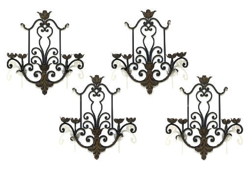 A SET OF FOUR PARCEL-GILT WROUGHT IRON FOUR-LIGHT WALL APPLIQUES