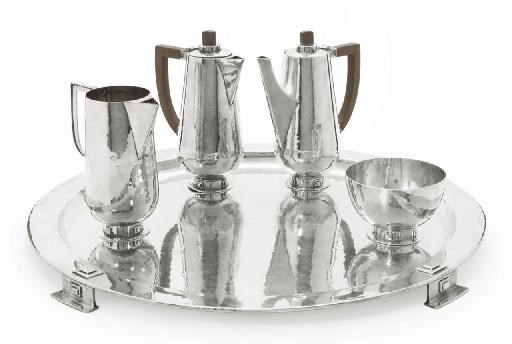 AN ARTS & CRAFTS SILVER COFFEE SERVICE