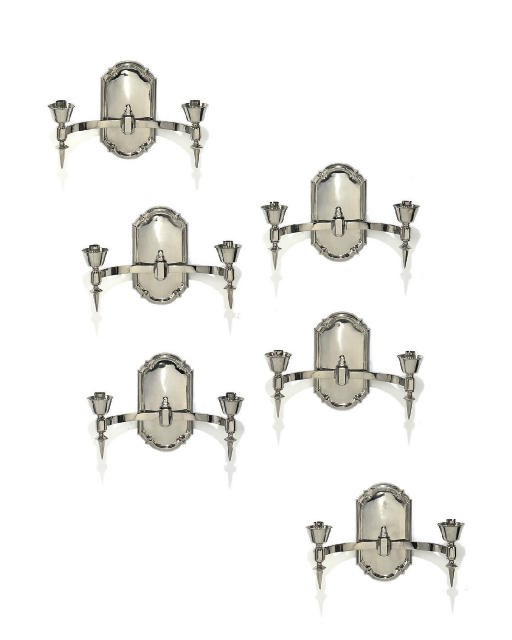 A SET OF SIX ART DECO SILVERED METAL TWIN-LIGHT WALL LIGHTS