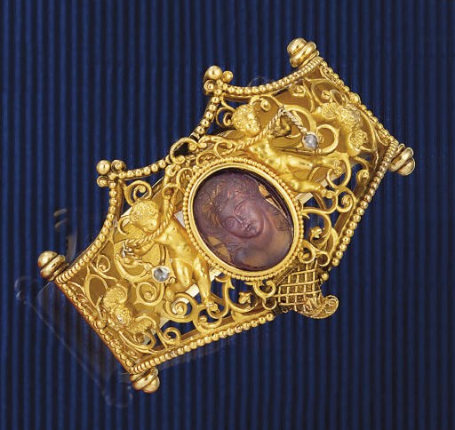 A 19th century neo-renaissance gold, amethyst and diamond bangle