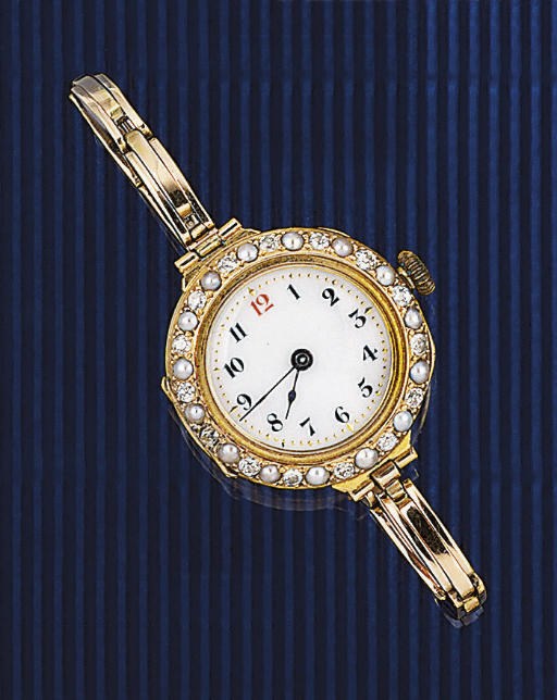 An aquamarine, diamond and cultured pearl brooch and a lady's wristwatch