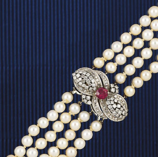 A CULTURED PEARL NECKLACE ON A RUBY AND DIAMOND CLASP