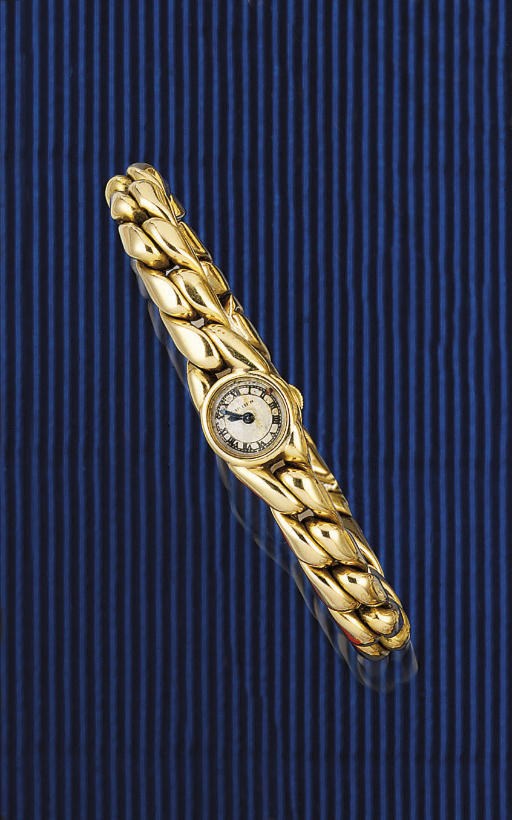 A LADY'S GOLD WRISTWATCH, BY CARTIER