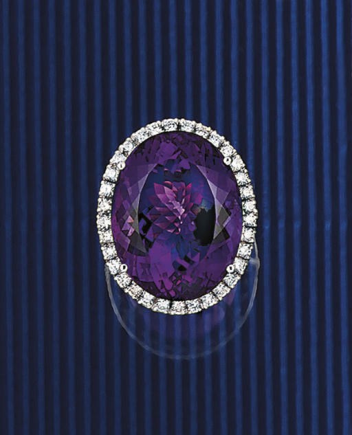 An amethyst and diamond cluster ring