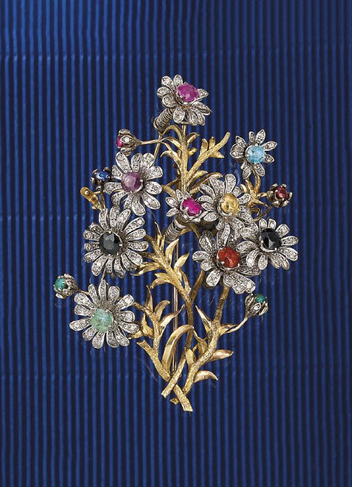 A DIAMOND AND GEM BROOCH
