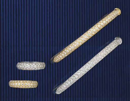 Two 18ct. gold and diamond bangles and rings