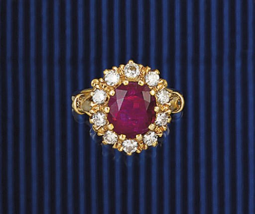 A RUBY AND DIAMOND CLUSTER RING