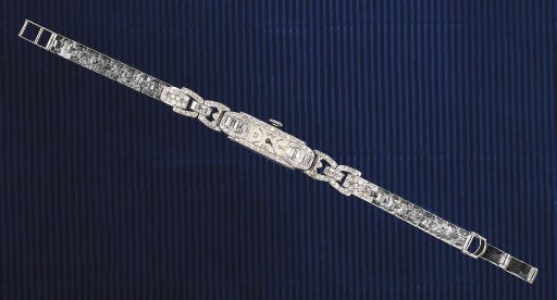 A LADY'S DIAMOND WRISTWATCH