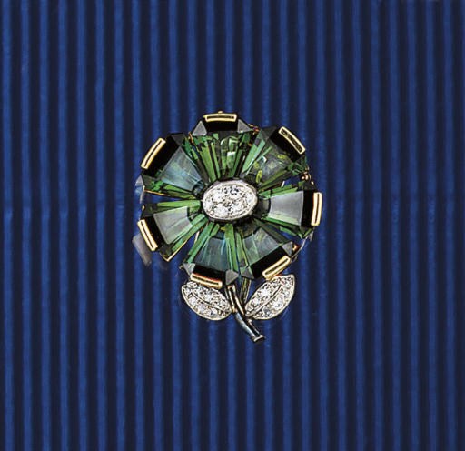 A green tourmaline and diamond brooch, by Gubelin