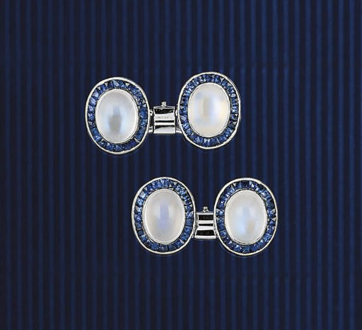 A pair of moonstone and sapphire cufflinks