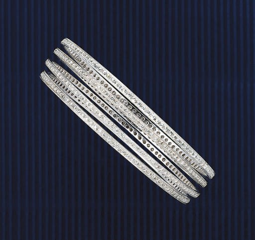 A set of four diamond bangles