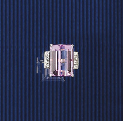 A kunzite and diamond ring