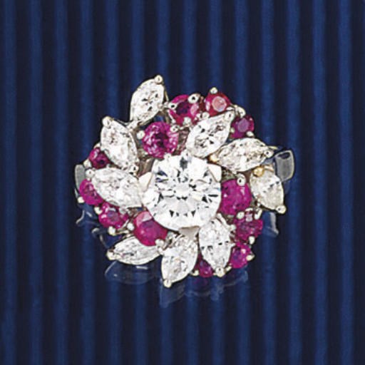 AN DIAMOND AND RUBY CLUSTER RING