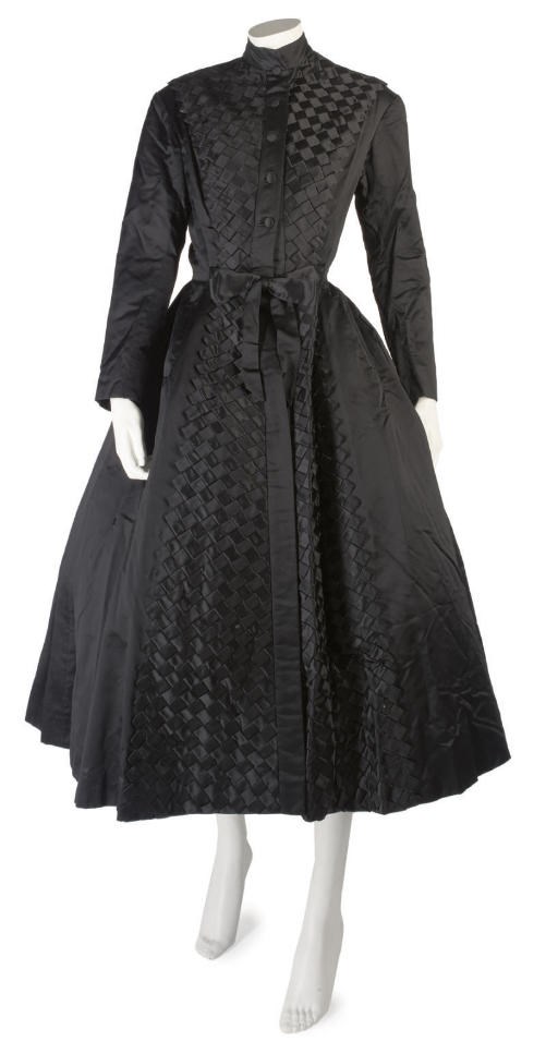 BALMAIN COUTURE, A FINE BLACK SILK COAT DRESS, CIRCA 1952
