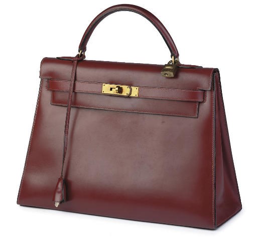 HERMÈS, AN OXBLOOD BOX LEATHER KELLY BAG