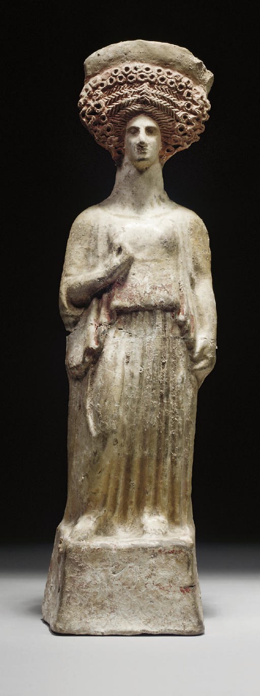 FIGURE DE FEMME DRAPEE EN TERRE CUITE