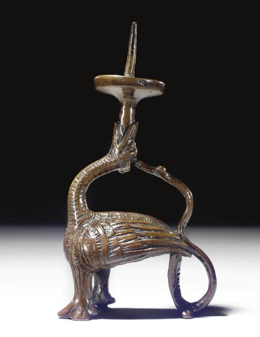 FLAMBEAU EN BRONZE PATINE EN FORME DE DRAGON