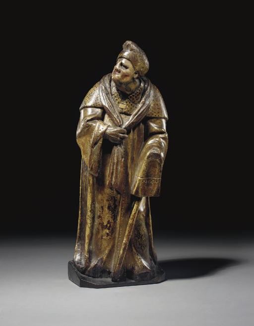 FIGURE DE VIEIL HOMME DRAPE EN BOIS SCULPTE, PEINT ET DORE