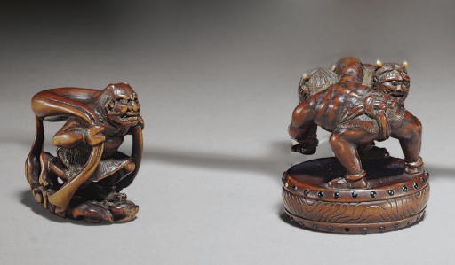 A Wood and Ivory Netsuke and Two Wood Netsuke**