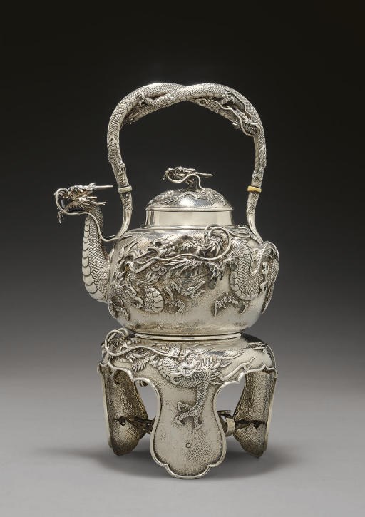 A Silver Tea Kettle and Stand
