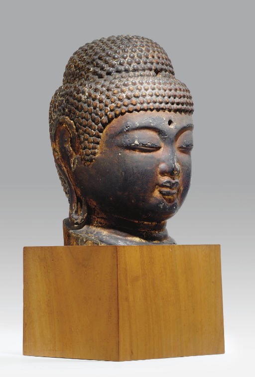 A Wood Head of the Buddha