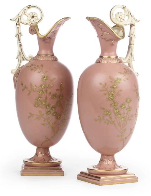 A PAIR OF GRAINGER'S WORCESTER SALMON-PINK GROUND EWERS