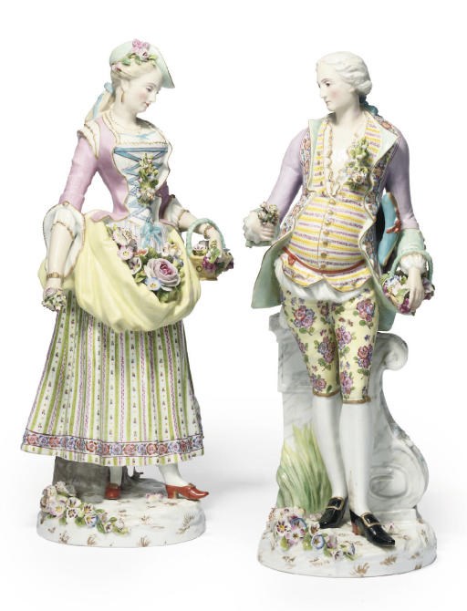 A PAIR OF GERMAN PORCELAIN FIGURES OF FLOWER-SELLERS