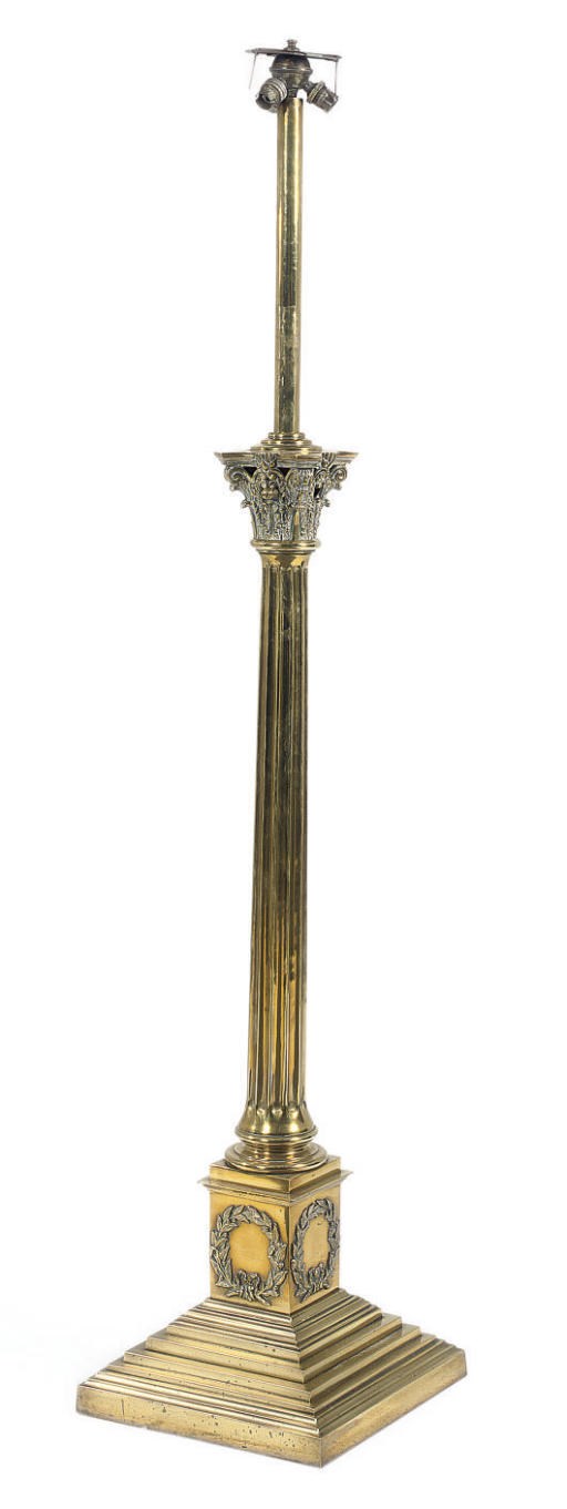 A LATE VICTORIAN BRASS CORINTHIAN COLUMN STANDARD LAMP