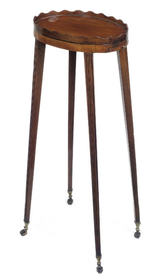 A GEORGE III MAHOGANY AND CROSSBANDED OVAL OCCASIONAL TABLE