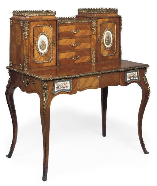 A MID VICTORIAN GILT-METAL AND PORCELAIN MOUNTED TULIPWOOD CROSSBANDED BONHEUR DU JOUR